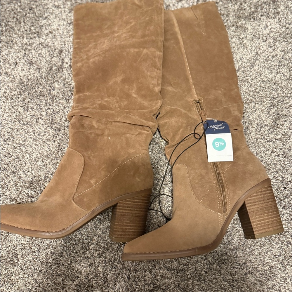 Knee-High boots with zipper on the side.